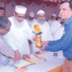 Dr. Fuzail Ahmad(Principal) Taking his Award by Ameer Shariyat